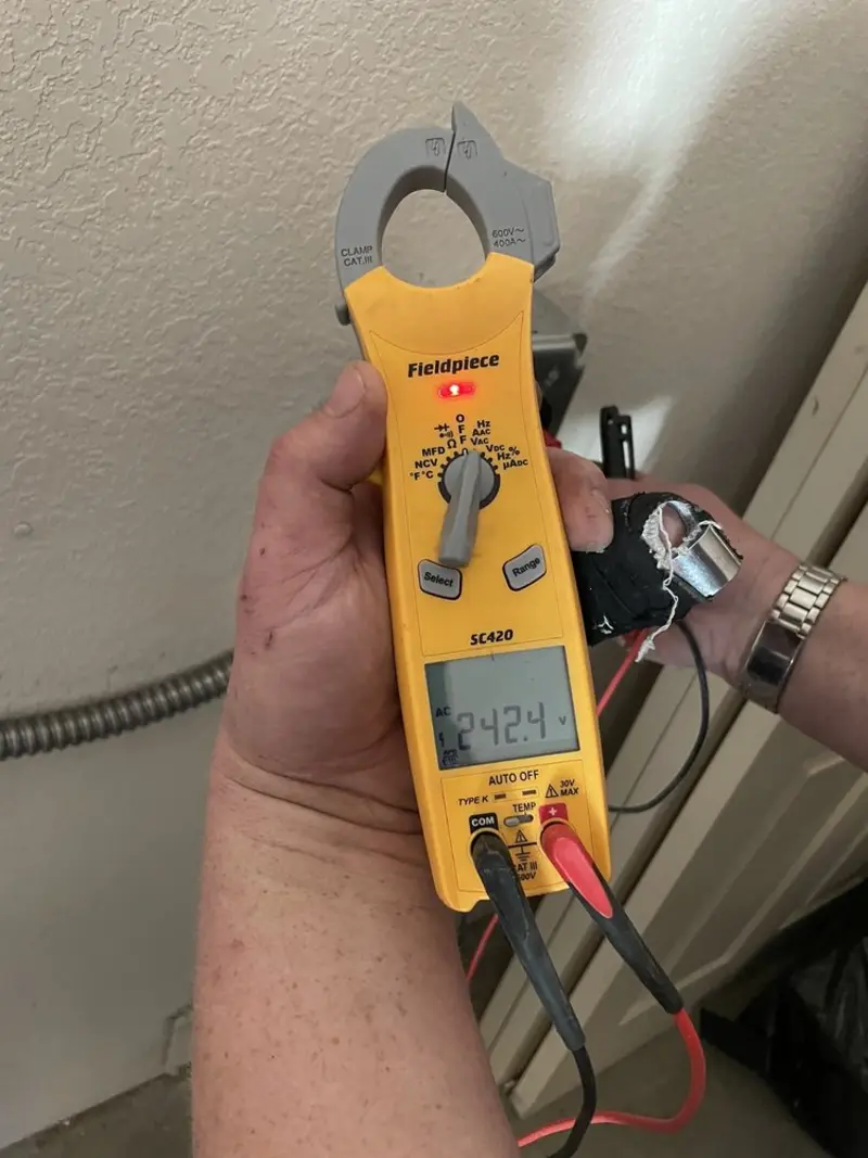 Voltage testing with clamp meter during Generator Installation in Rothschild